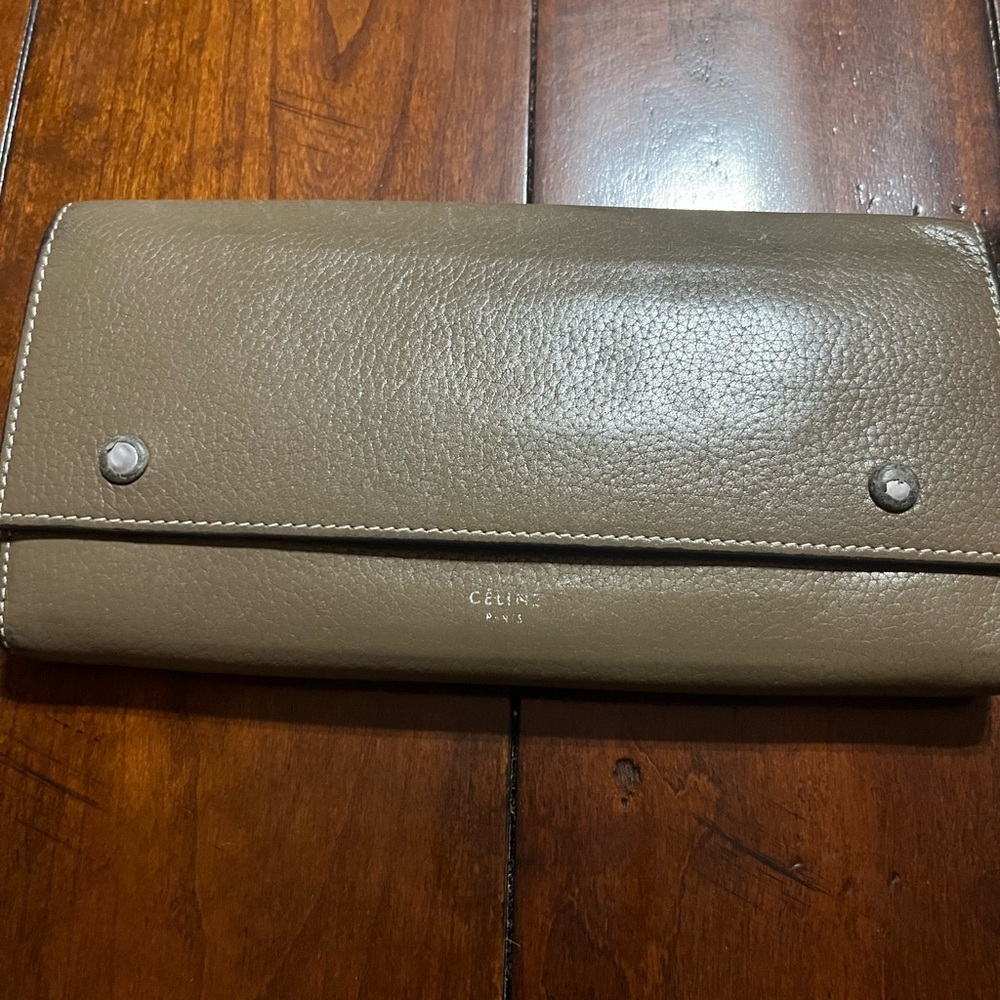 Celine leather wallet in tan with bright yellow interior